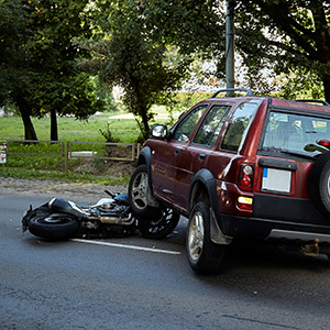 Damaged car and motorcycle after crash in New Brunswick NJ